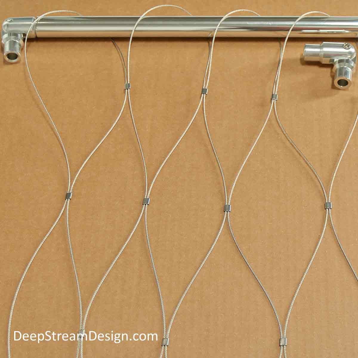 A studio photos of Jakob Swiss 316-stainless steel mesh showing construction and how to thread the supporting frame.
