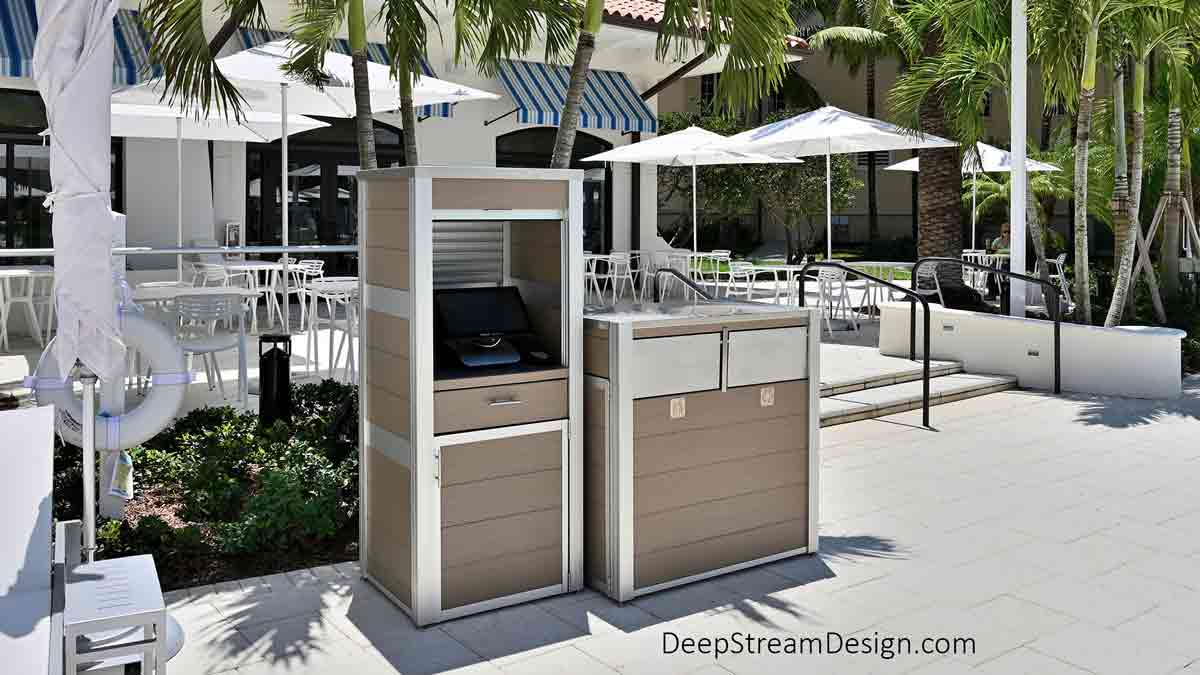 A Weatherproof Enclosure for a Symphony Point-of-Sale Systems, an important component of DeepStream's outdoor cabinetry and fixtures, at a 5-Star hotel's award-winning tropical water park stands ready to speed orders to the kitchen and bar to improve the guest experience. The waterproof cabinet with aluminum tambour door and 316 stainless steel lid is located next to a combined commercial recycling and trash receptacle that also has a stainless steel lid and is crafted from aged hardwood-colored recycled plastic lumber.